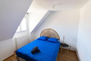 En eller flere senge i et værelse på VILLA Marly