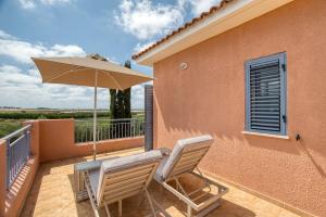 Μπαλκόνι ή βεράντα στο Mandria Gardens 2 BED