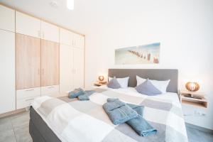 En eller flere senge i et værelse på Apartment YoungFamily, Am Alten Deich 14 2