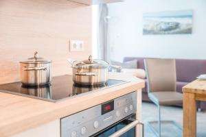 Køkken eller tekøkken på Apartment YoungFamily, Am Alten Deich 14 2