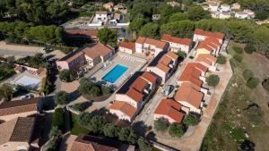 an aerial view of a house with a swimming pool at Appart'hotel Résidence La Provence in Istres