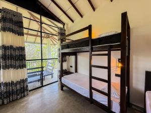 Postel nebo postele na pokoji v ubytování Go Yala Hostel