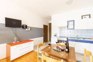 Kuchyň nebo kuchyňský kout v ubytování Apartments Galinec