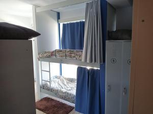 Postel nebo postele na pokoji v ubytování Hostel Renato