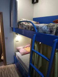 Postel nebo postele na pokoji v ubytování Hostel Renato