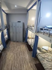 Postel nebo postele na pokoji v ubytování Hostel Renato