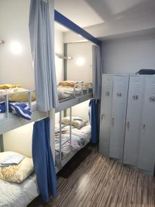 Postel nebo postele na pokoji v ubytování Hostel Renato