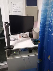 TV a/nebo společenská místnost v ubytování Hostel Renato
