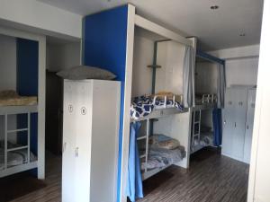 Postel nebo postele na pokoji v ubytování Hostel Renato
