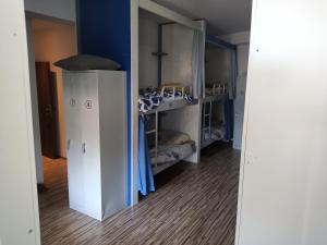 Postel nebo postele na pokoji v ubytování Hostel Renato