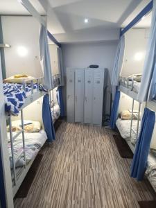 Postel nebo postele na pokoji v ubytování Hostel Renato