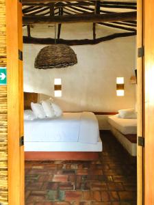 Ένα ή περισσότερα κρεβάτια σε δωμάτιο στο LOLO & Lo- Casa privada con vista, hamaca y ubicación ideal 2 hab y Starlink