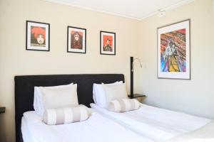 Postel nebo postele na pokoji v ubytování Hotell Björkhaga