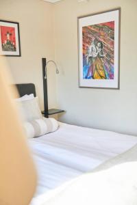 Postel nebo postele na pokoji v ubytování Hotell Björkhaga