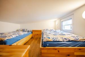 Katil atau katil-katil dalam bilik di Tiny Haus Boddenblick