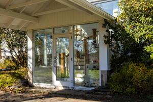 an open glass door on a house at The Kinley House in Lunenburg