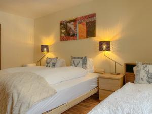 Postelja oz. postelje v sobi nastanitve Hotel Harder Minerva