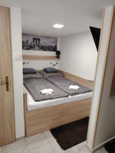 Postel nebo postele na pokoji v ubytování Apartmán LUKA 3