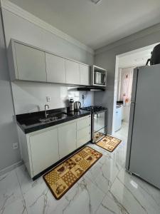 Η κουζίνα ή μικρή κουζίνα στο Loft 408 Ed Infinity Paradise +2 φωτογραφίες