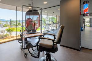 Telewizja i/lub zestaw kina domowego w obiekcie Hotel Vibra District - Adults Only