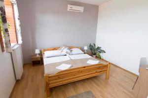 Postel nebo postele na pokoji v ubytování Resort Zajíci ze Zaječí