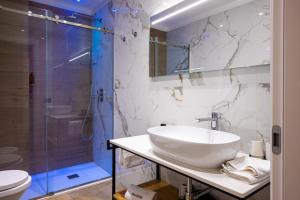 Koupelna v ubytování Delle Vittorie Luxury Rooms&Suites + 37 fotografií