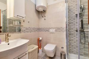 Kúpeľňa v ubytovaní Apartments Ady