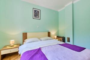 Posteľ alebo postele v izbe v ubytovaní Apartments Ady