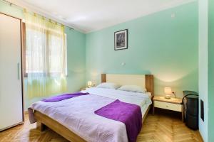 Posteľ alebo postele v izbe v ubytovaní Apartments Ady