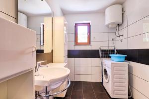 Kúpeľňa v ubytovaní Apartments Ady