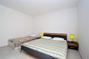 Posteľ alebo postele v izbe v ubytovaní House Rahela