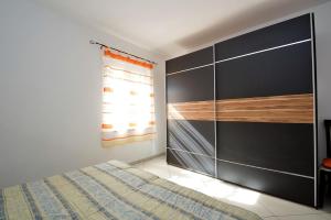 Posteľ alebo postele v izbe v ubytovaní House Rahela