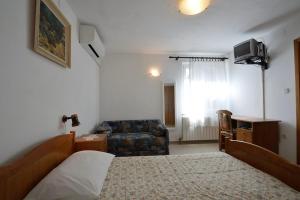 Posteľ alebo postele v izbe v ubytovaní House Rahela