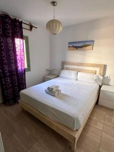 Postel nebo postele na pokoji v ubytování Isla Blanca I 2B ET - 179 PL