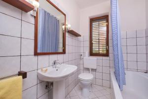 Koupelna v ubytování Apartment Lejla 1 + 15 fotografií