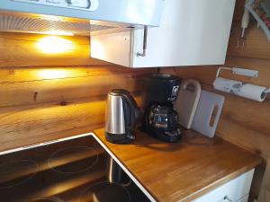 Kuchyň nebo kuchyňský kout v ubytování Poukama Cottage Päijätsalo