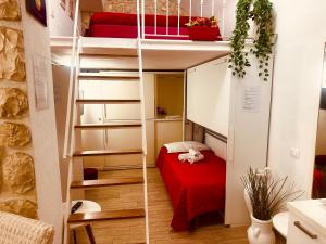 A bed or beds in a room at Le Chalet Palermo Centro