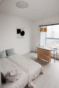 Postel nebo postele na pokoji v ubytování Studio Apartment next to the airport and metro Vantaa Kivistö