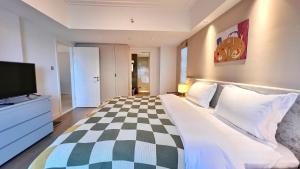 Qian's House Wanyu All-Suite Holiday Apartment電視和／或娛樂中心