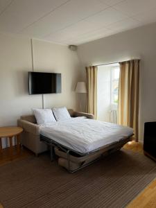 Postel nebo postele na pokoji v ubytování Hotel Bishops Arms Strängnäs