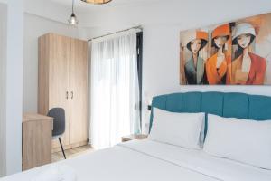Letto o letti in una camera di Danai & Palm Residential Complexes