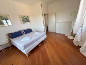 Posteľ alebo postele v izbe v ubytovaní Casa Vacanze Magnolia