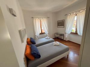 Posteľ alebo postele v izbe v ubytovaní Casa Vacanze Magnolia