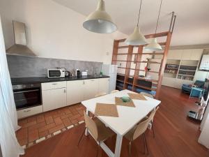 Kuchyňa alebo kuchynka v ubytovaní Casa Vacanze Magnolia