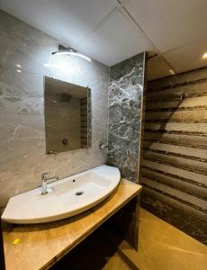 Koupelna v ubytování HOTEL WIND FLOWER Andheri West + 10 fotografií