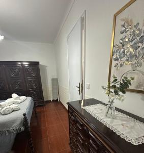 Uma cama ou camas num quarto em Island Haven - Cantinho da Ilha