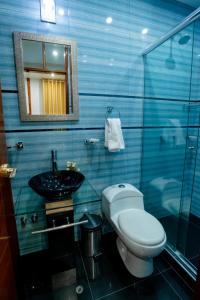 Koupelna v ubytování Hotel Melthon Class