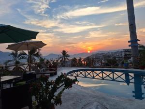 The sunrise or sunset as seen from a vendégházakat or nearby