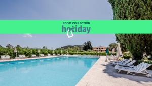 Bazén v ubytování HOTIDAY Room Collection - Lacona nebo v jeho okolí
