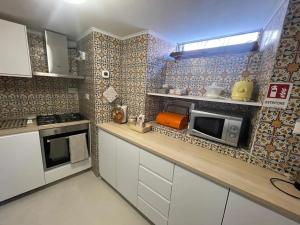 Kuchyňa alebo kuchynka v ubytovaní Comfortable Apartment in the Heart of Rome, 65m², City View